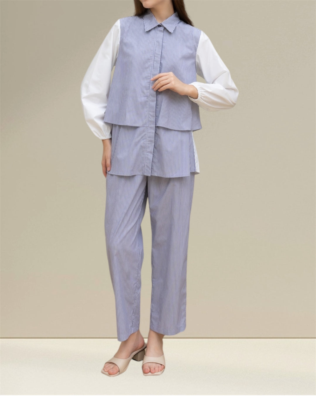 Saara Nursing Top and Co-ord Set, a thoughtfully designed breastfeeding outfit that combines practicality with effortless style. This ensemble features a comfortable nursing top and trousers in timeless blue with white stripes, ideal for casual and semi-formal occasions. 