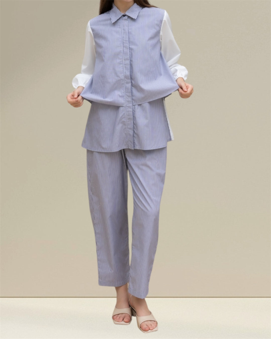 Saara Nursing Top and Co-ord Set, a thoughtfully designed breastfeeding outfit that combines practicality with effortless style. This ensemble features a comfortable nursing top and trousers in timeless blue with white stripes, ideal for casual and semi-formal occasions. 