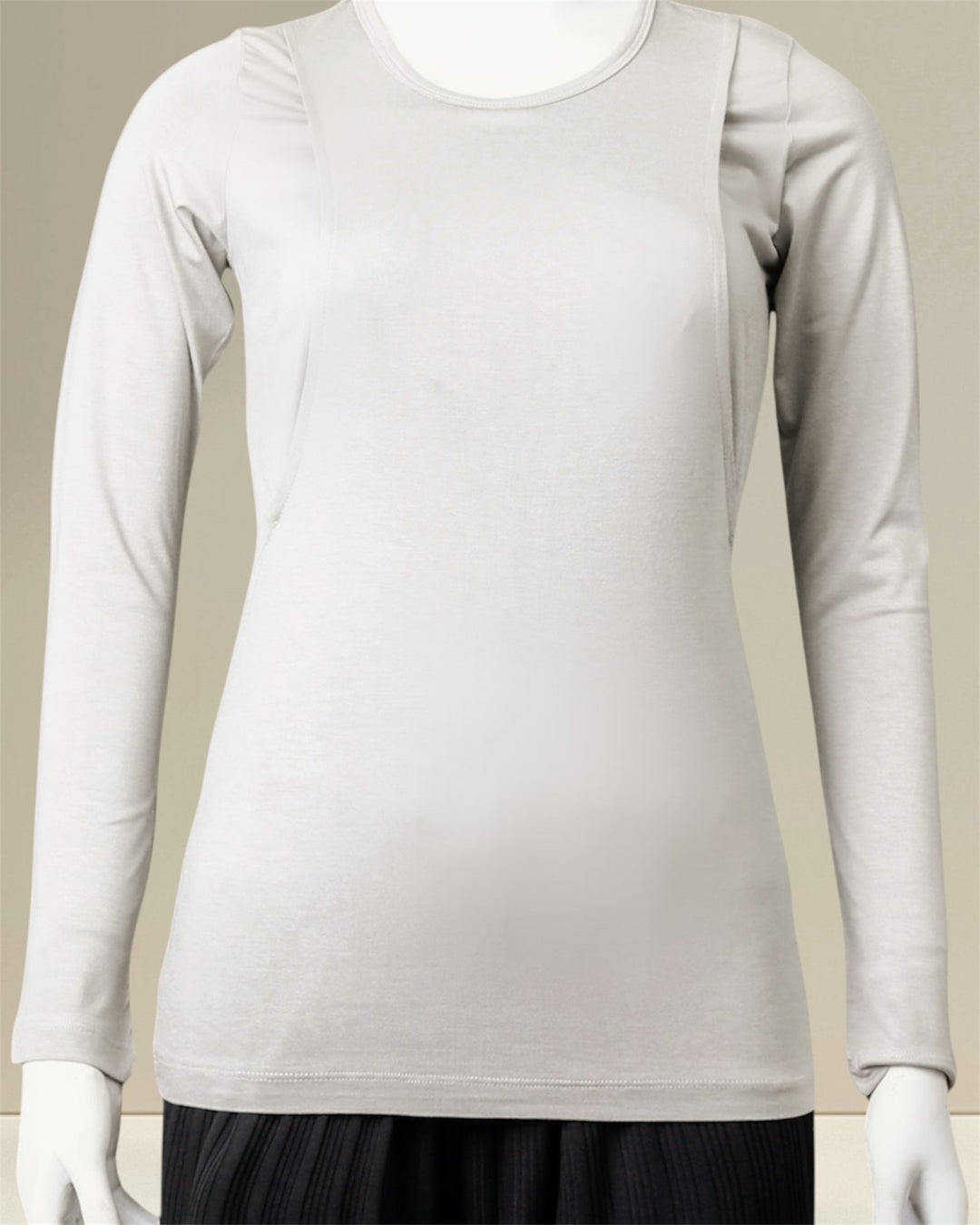 Asma Nursing Top in light grey, designed for nursing moms who prioritize comfort, modesty, and timeless style. Featuring easy breastfeeding access for discreet nursing at home or on the go, this modest nursing top offers full coverage and a flattering silhouette.