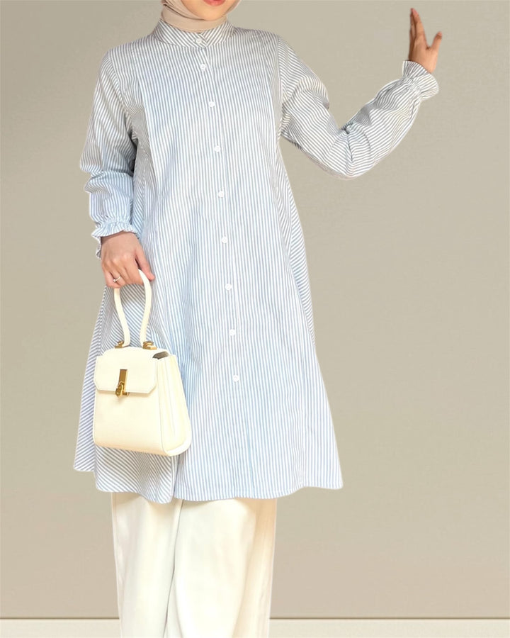 Aliya Nursing Top in white and green stripes, designed for nursing moms with easy breastfeeding access for effortless and discreet feeding.