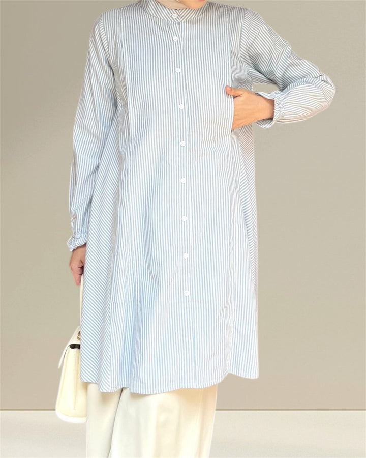 Aliya Nursing Top in white and green stripes, designed for nursing moms with easy breastfeeding access for effortless and discreet feeding.