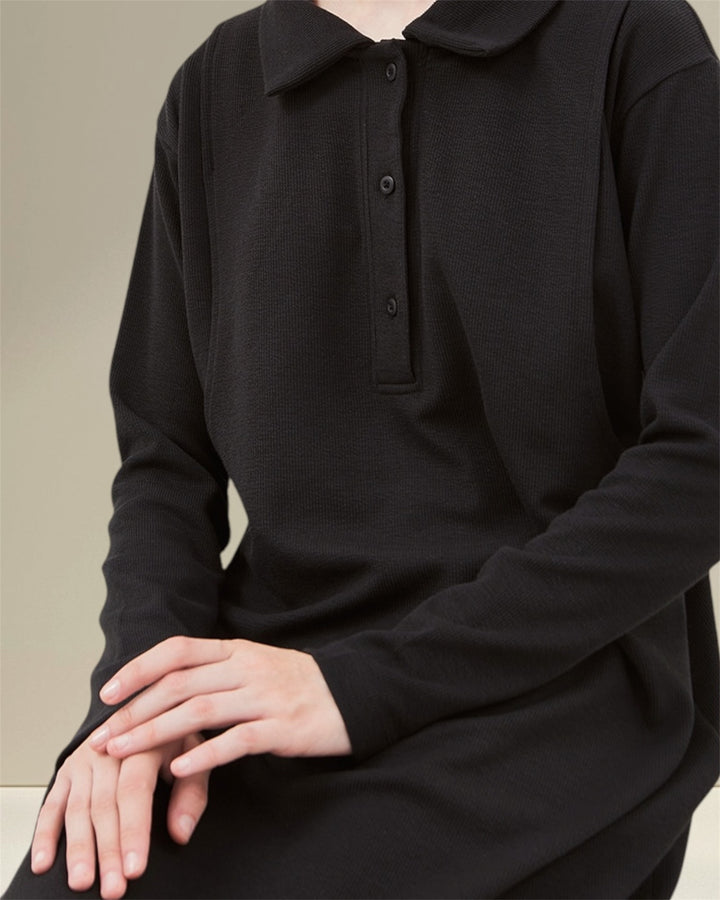 Huda Long Nursing Dress made from 94% polyester and 6% spandex yuki rib knit, featuring an elastic and smooth feel for all-day comfort. The dress includes practical buttons for easy wear and vertical openings on both sides for discreet breastfeeding, making it ideal for both pregnancy and nursing while combining style and functionality."