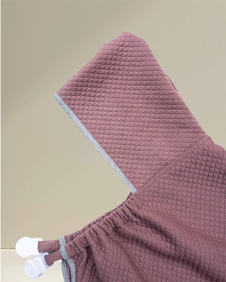 Soft and breathable breastfeeding cover blanket designed for moms and babies, featuring a snug hood for warmth during breastfeeding, naps, or travel. This versatile nursing cover is adjustable for comfort and easy access, and it also doubles as a pushchair blanket for outings.