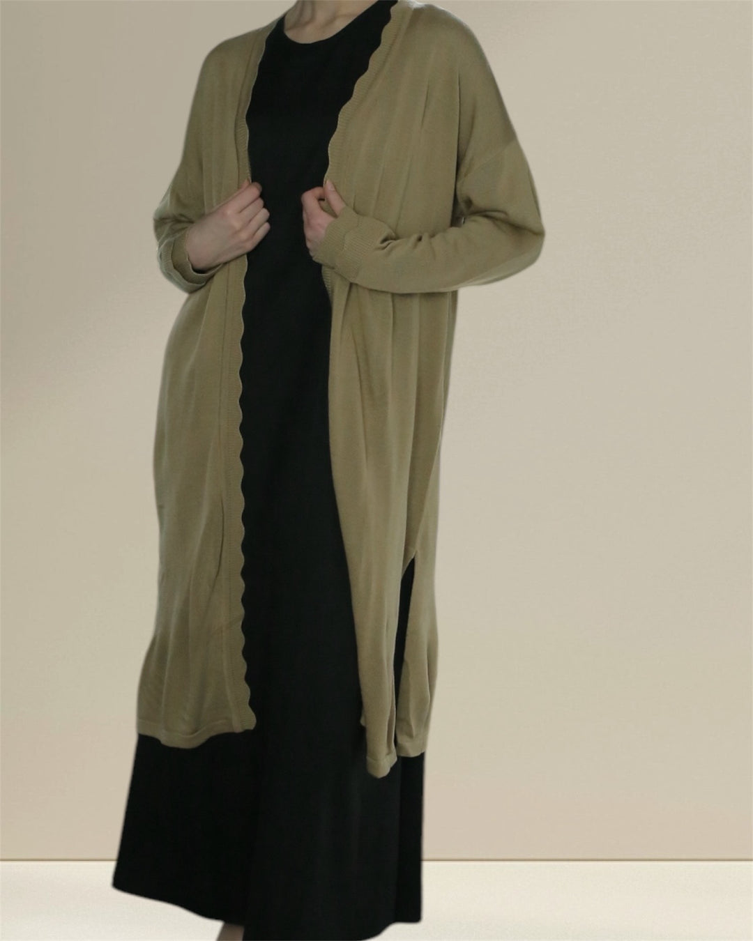 Breastfeeding  Jannah Set for breastfeeding mums, showcasing a flowing olive green cardigan and a timeless black nursing dress underneath. This nursing-friendly outfit provides full coverage and a chic look, ideal for various occasions.