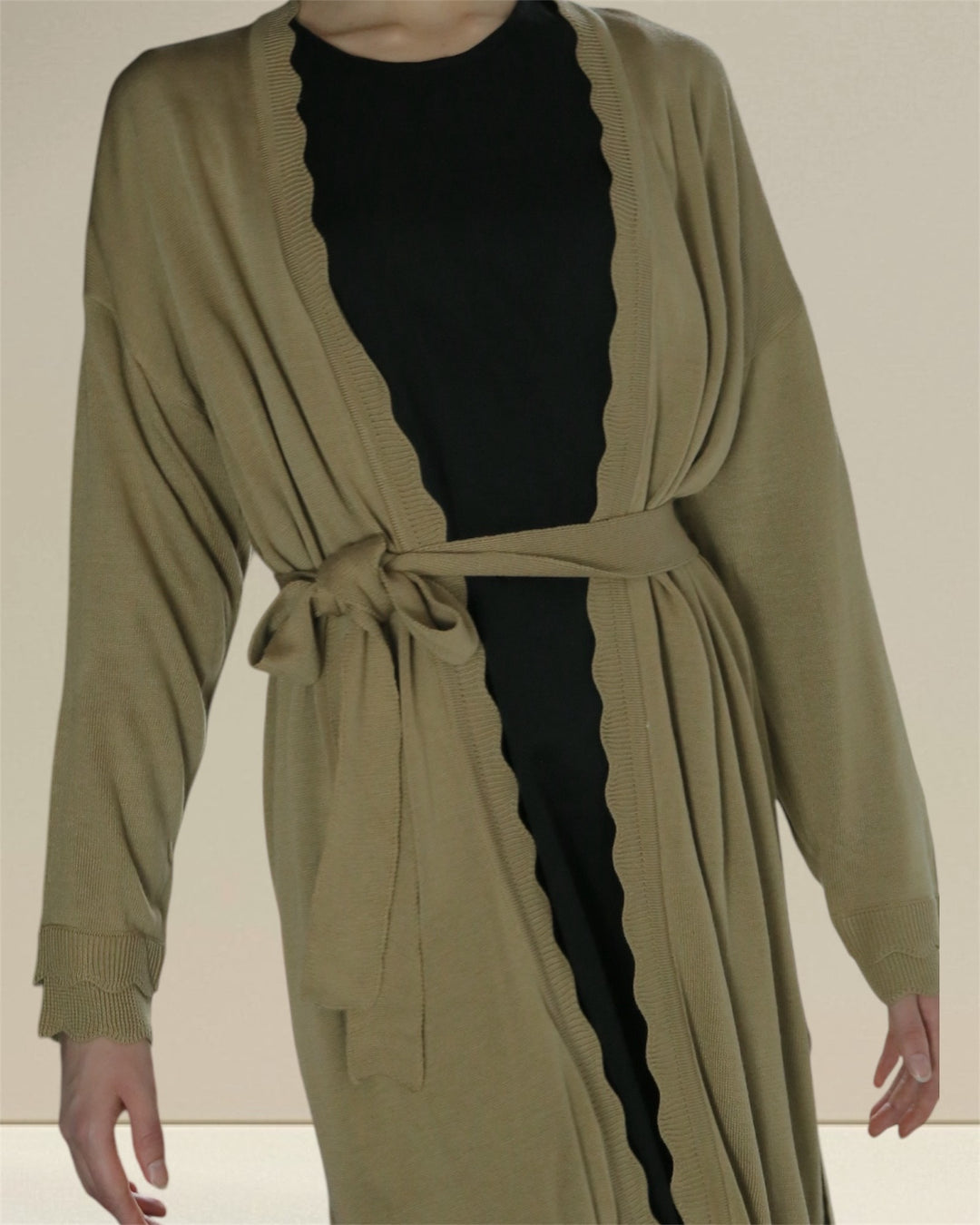Breastfeeding Versatile Jannah Set designed for breastfeeding, combining an olive green cardigan with a black nursing dress for a sophisticated appearance. This nursing clothes ensures easy access for breastfeeding while keeping mums stylish and comfortable.